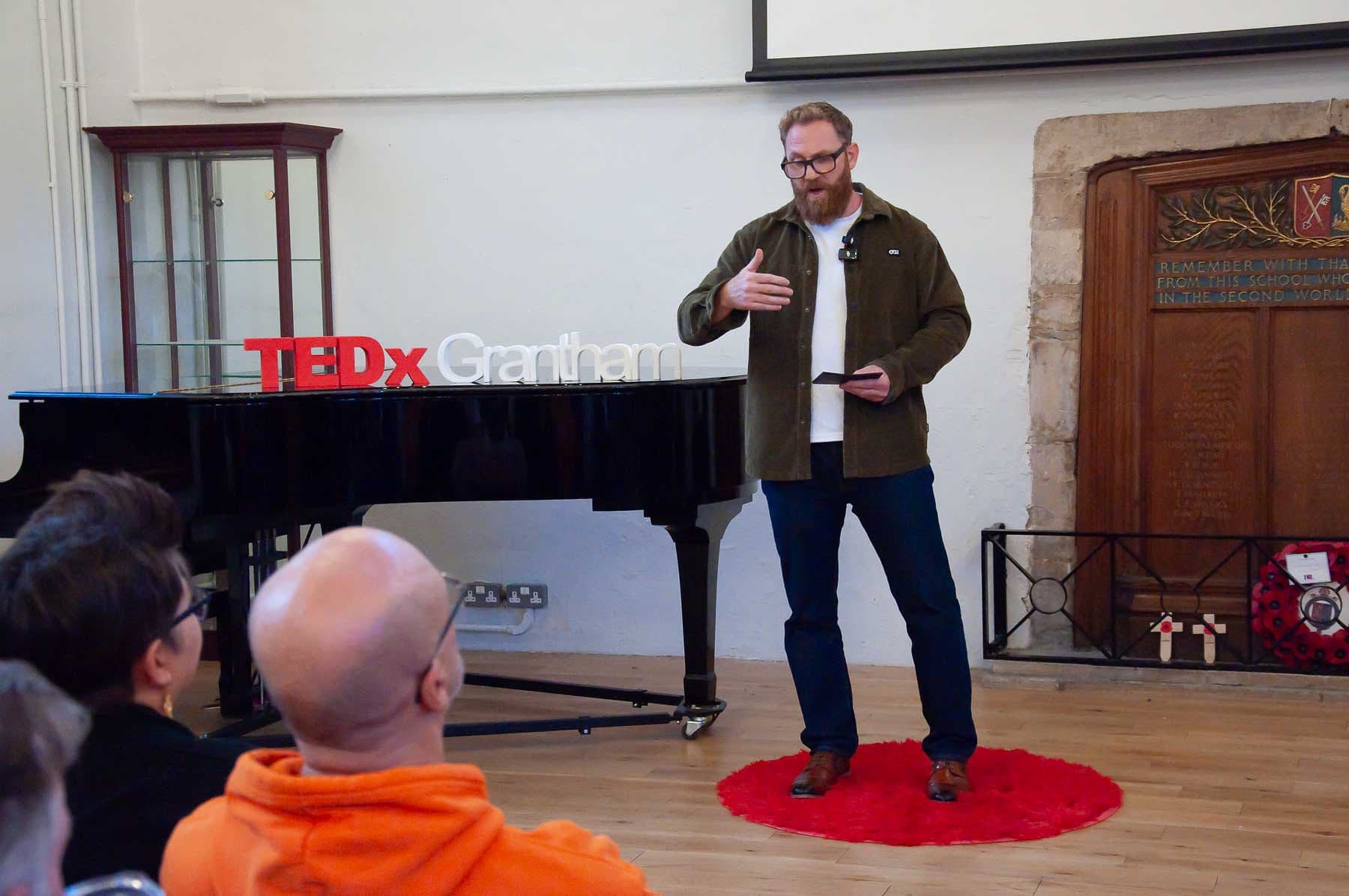 Matt Craven speaking with the audience in the foreground