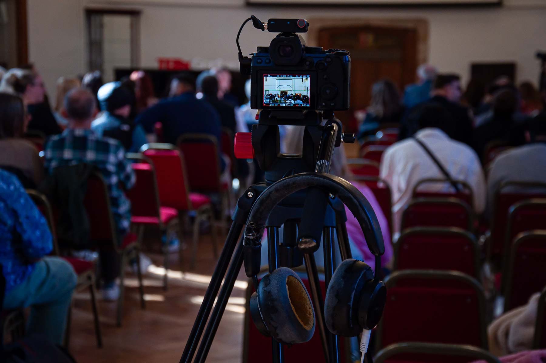 Video camera behind the seated TEDxGrantham audience